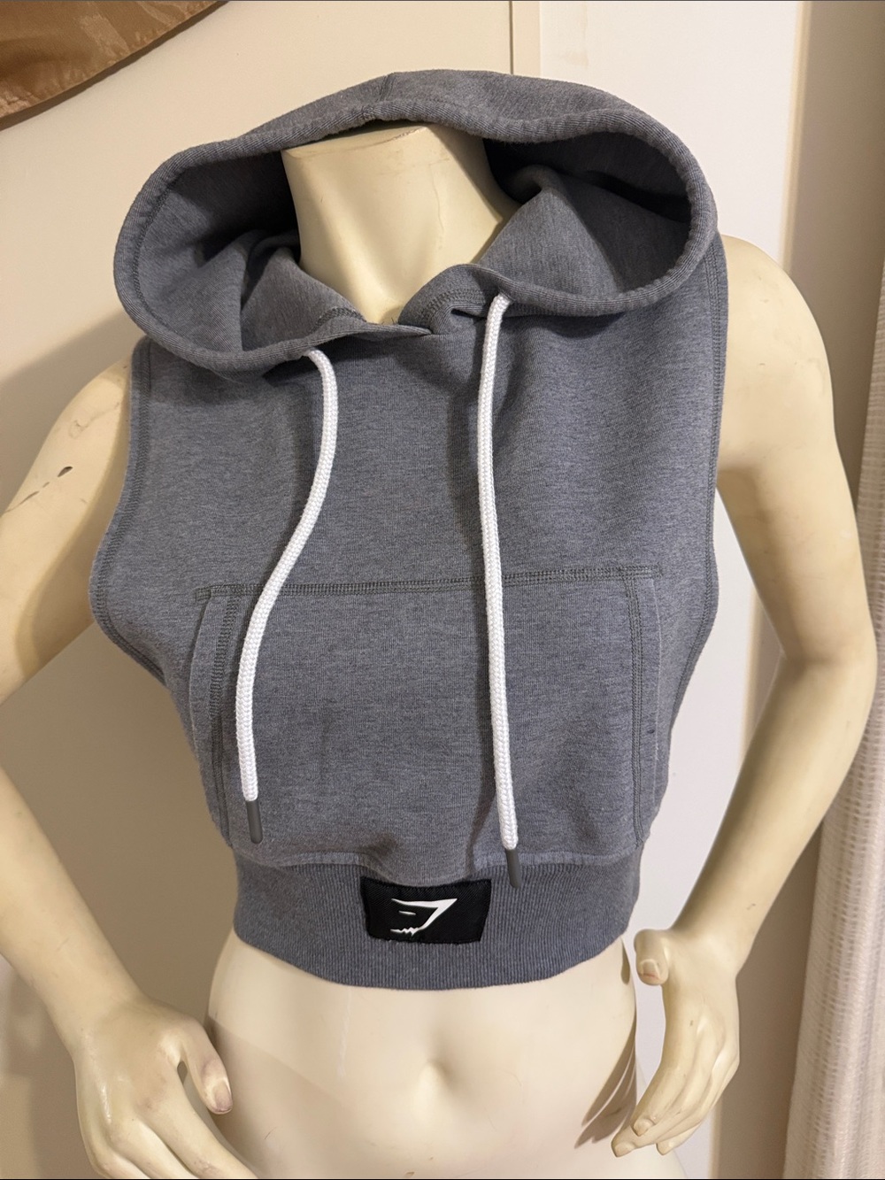 Gymshark Gray Cropped Sleeveless Hoodie with White Drawstrings